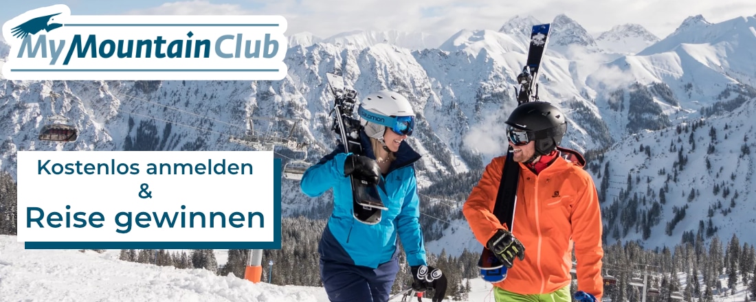 MyMountainClub Reise gewinnen; Mann und Frau mit Ski-Ausrüstung in den Bergen