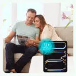 Gewinnspiel von tageszeitung24; Mann und Frau sitzen mit Tageszeitung auf Couch; apple iPad im Vordergrund